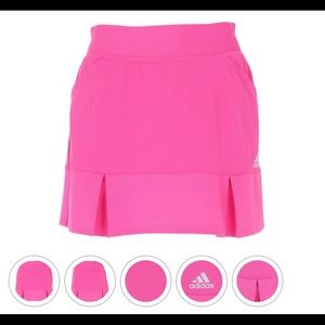Pink Nike perforated pleated small golf skirt. NWT